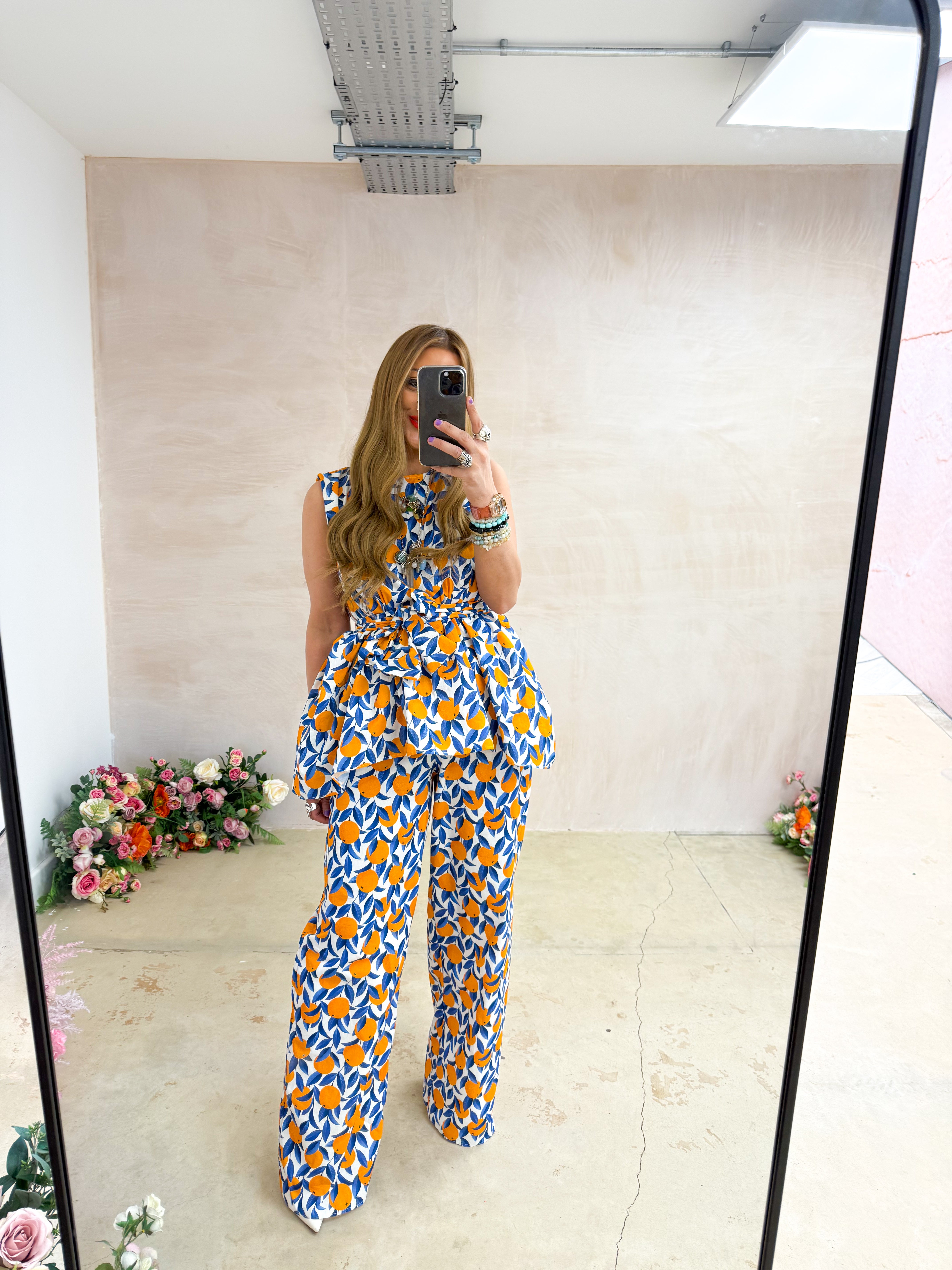 The Sicilia Wide Leg Trousers In Scattered Orange Print