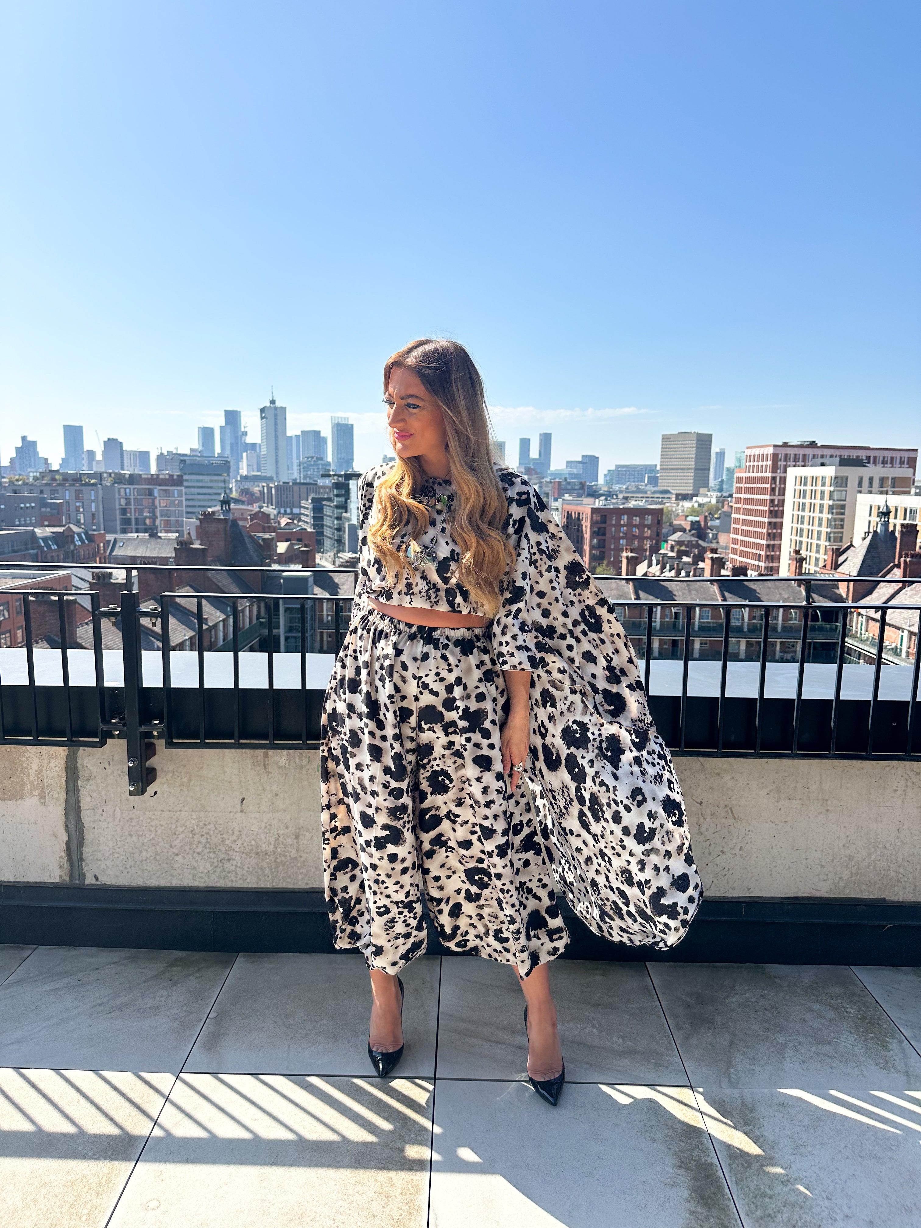 The Jasmine Chiffon Cape Top In Abstract Leopard Print