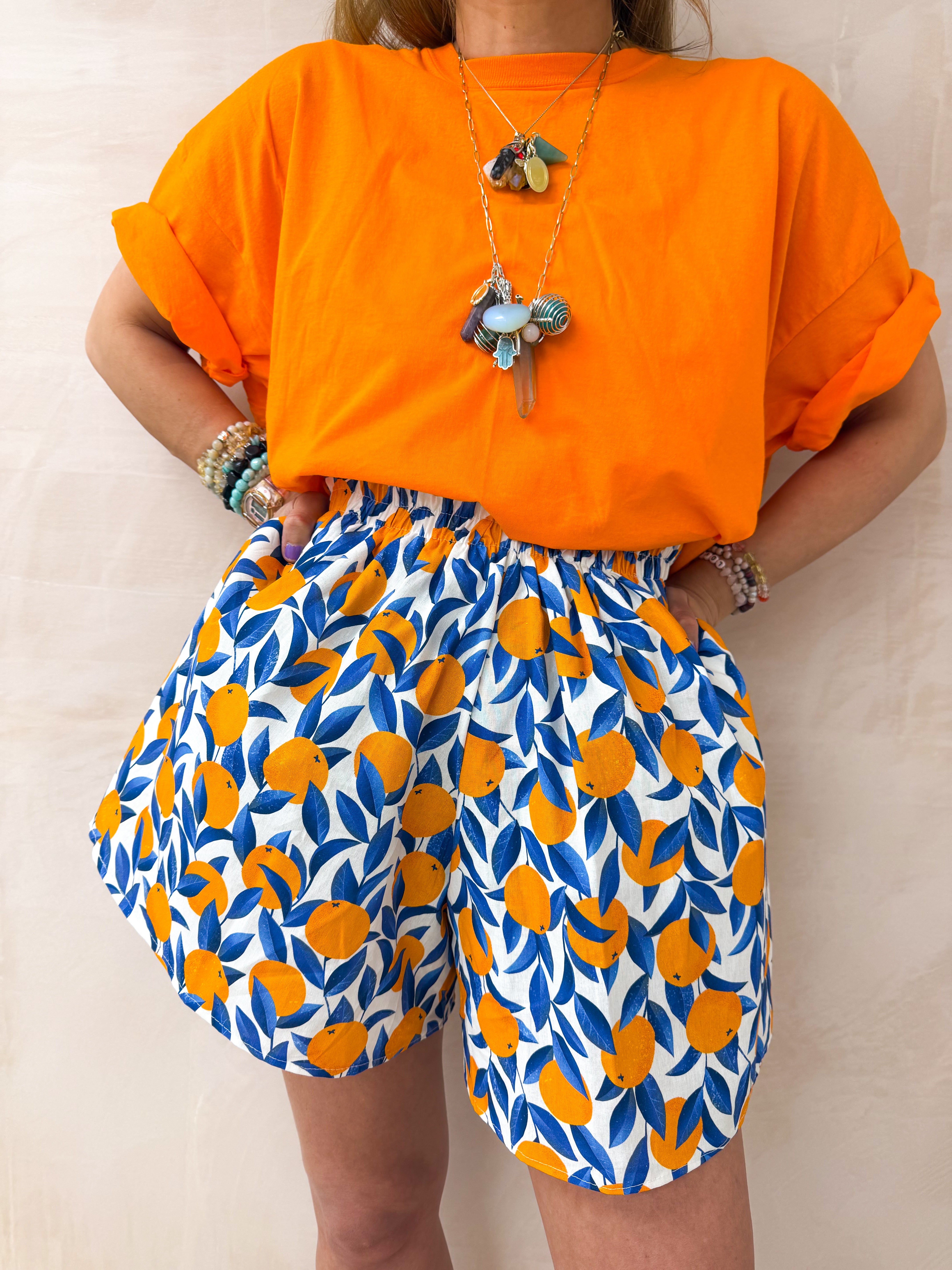 The Sicilia Runner Shorts In Scattered Orange Print