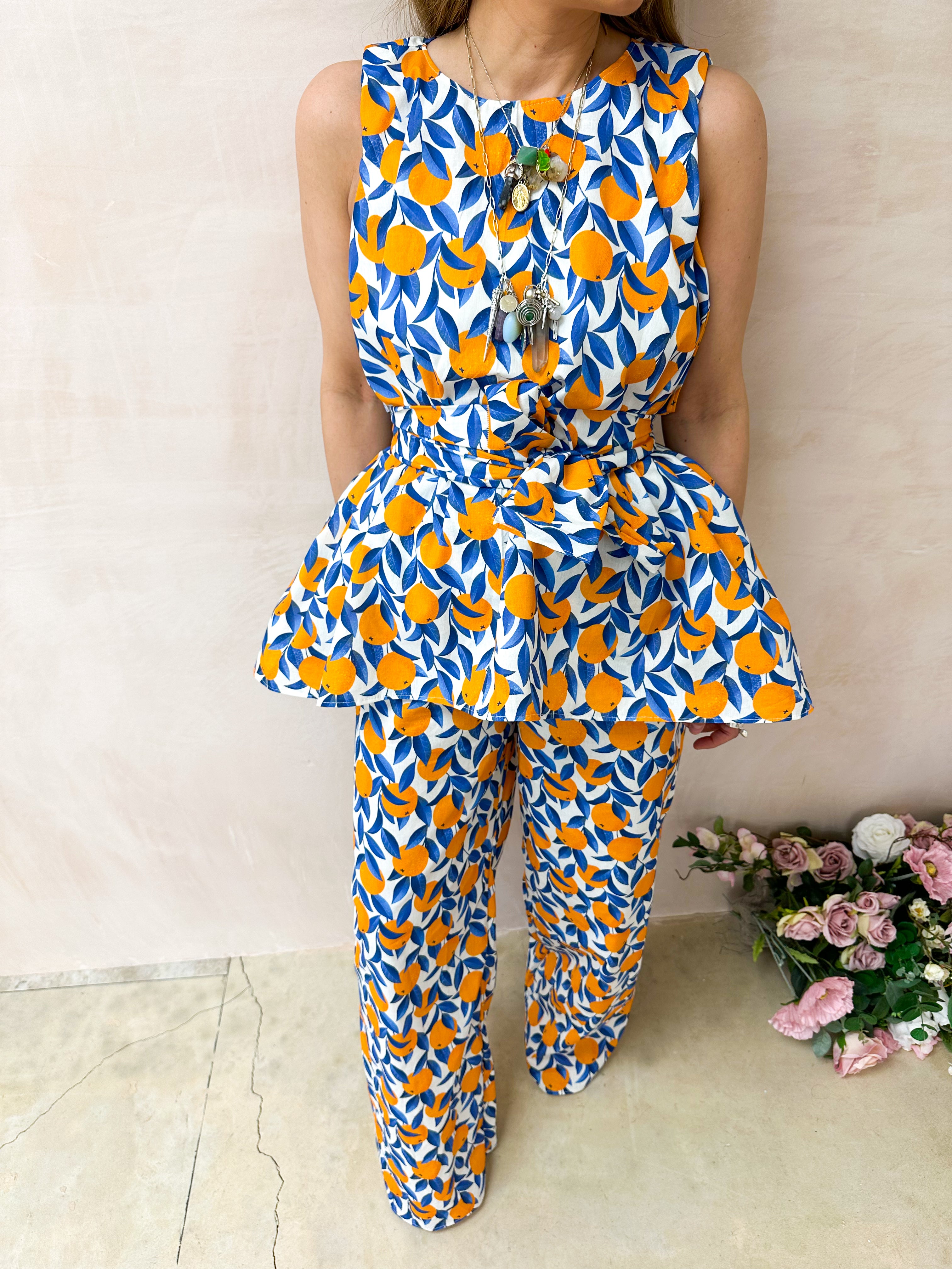 The Sicilia Wide Leg Trousers In Scattered Orange Print