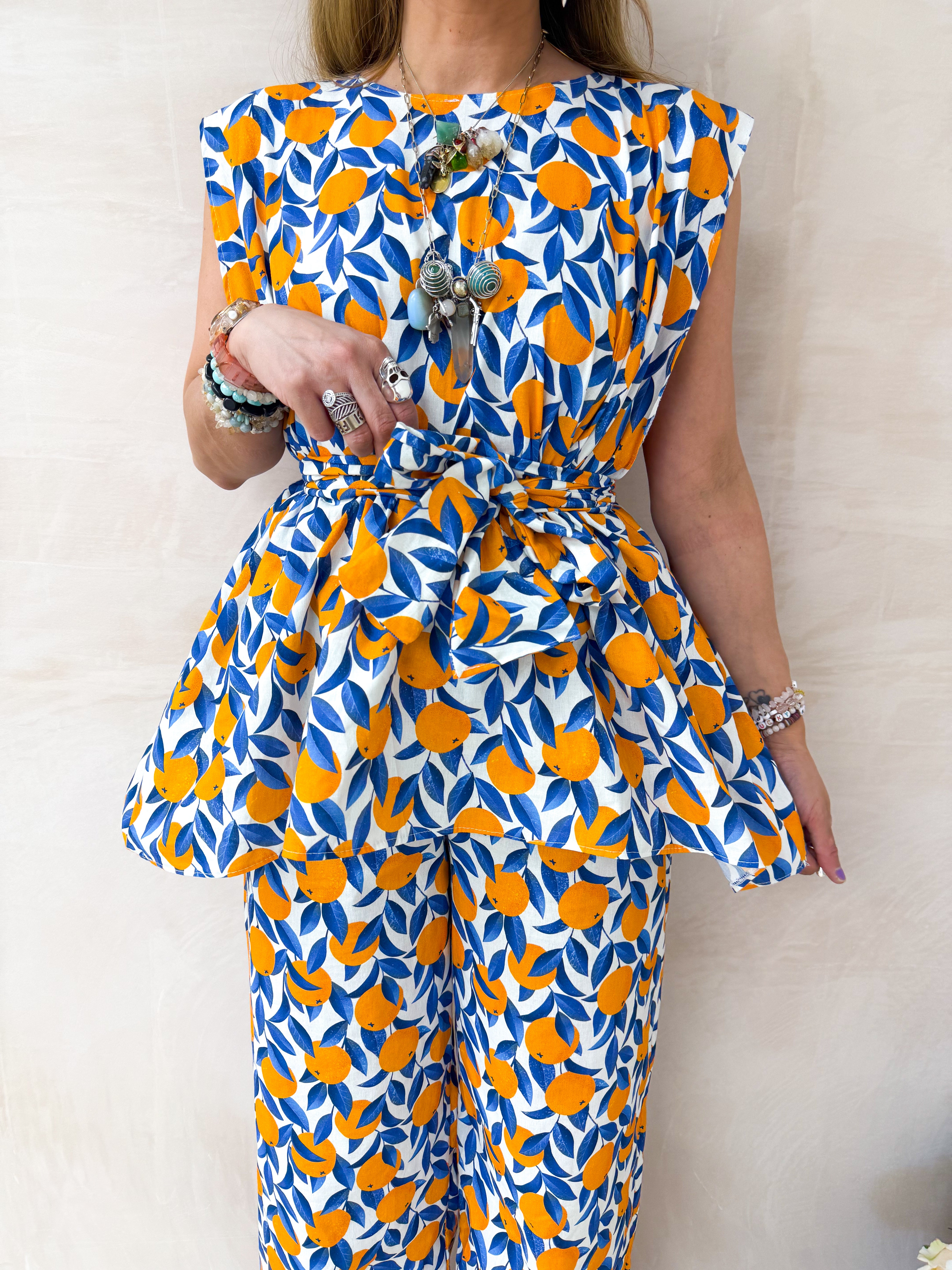 The Sicilia Belted Top In Scattered Orange Print
