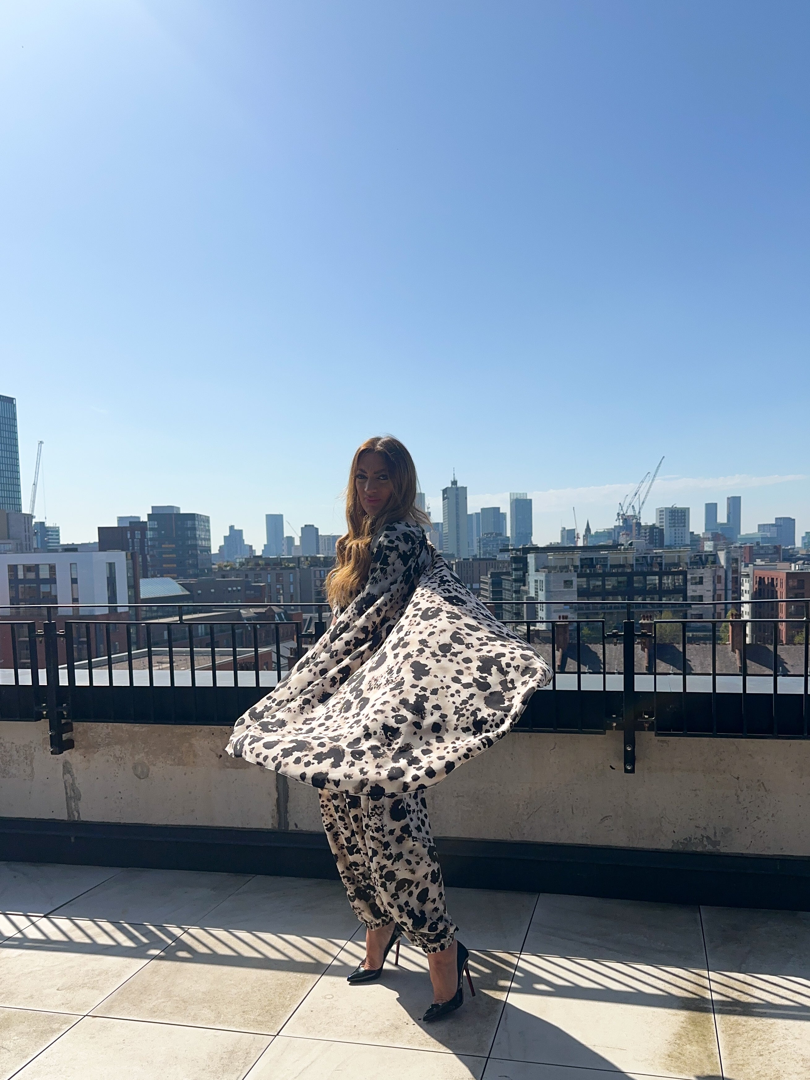 The Jasmine Chiffon Cape Top In Abstract Leopard Print