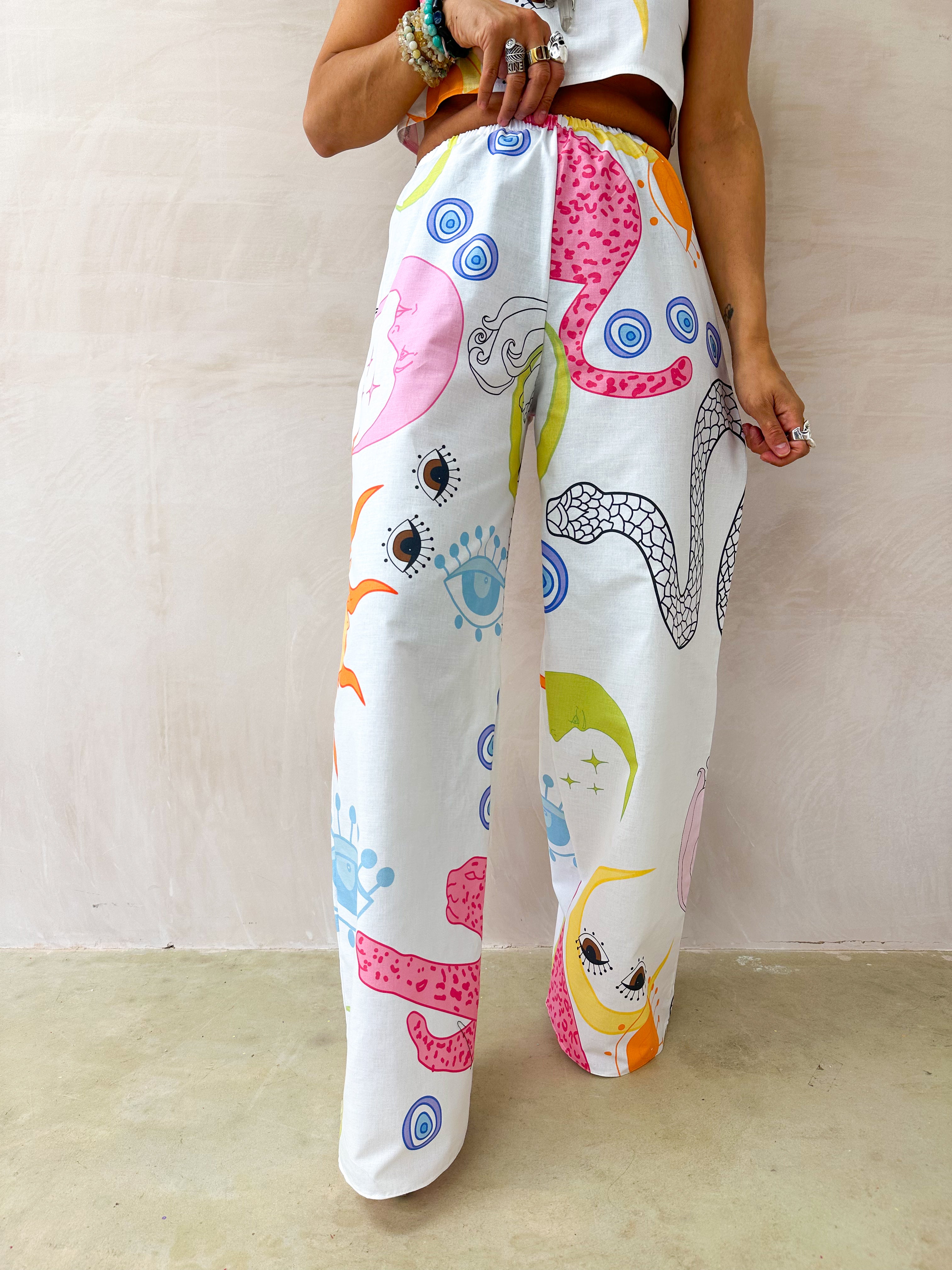 The Spellbound Wide Leg Trousers In White Mystical Print