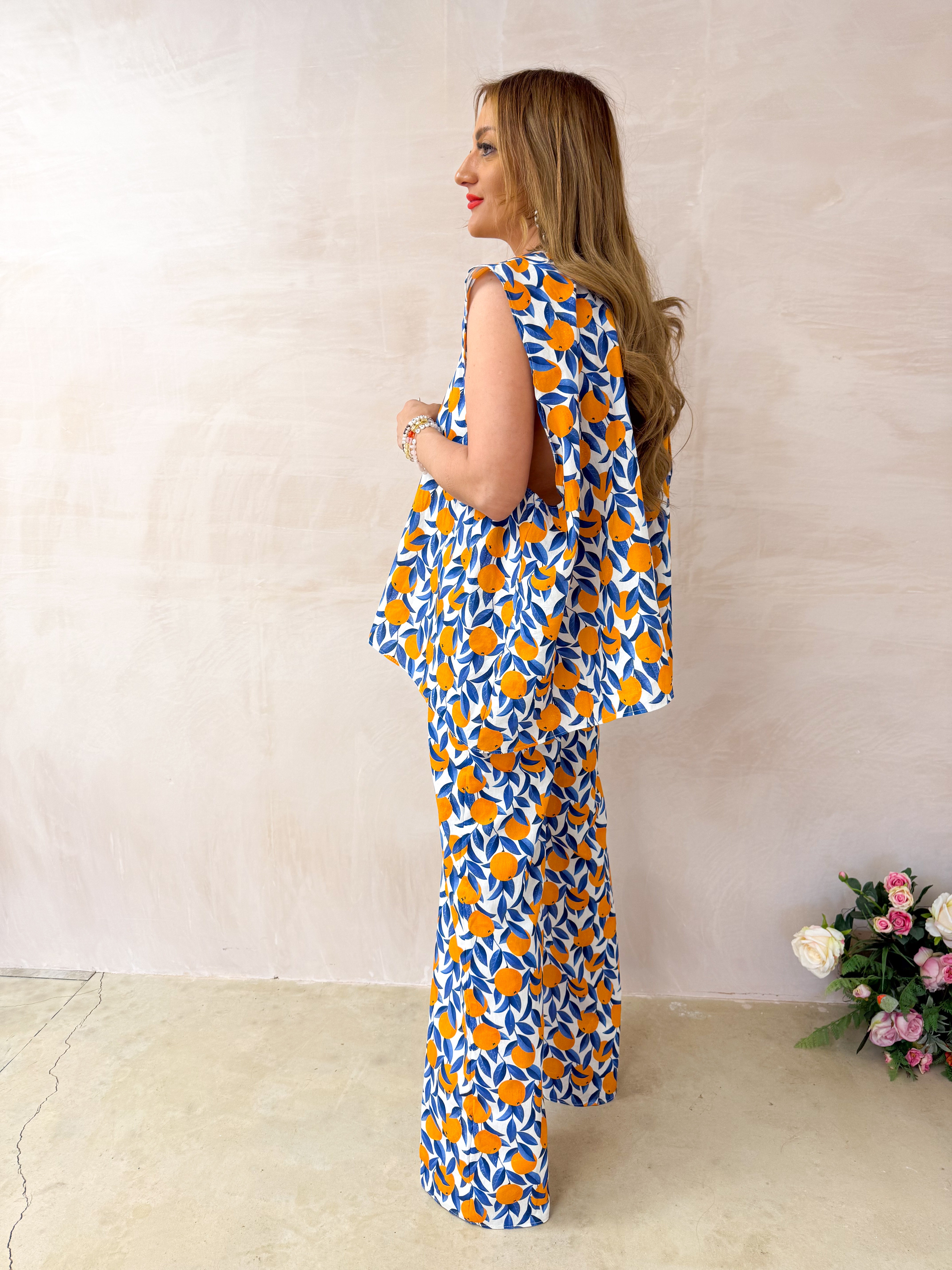 The Sicilia Wide Leg Trousers In Scattered Orange Print