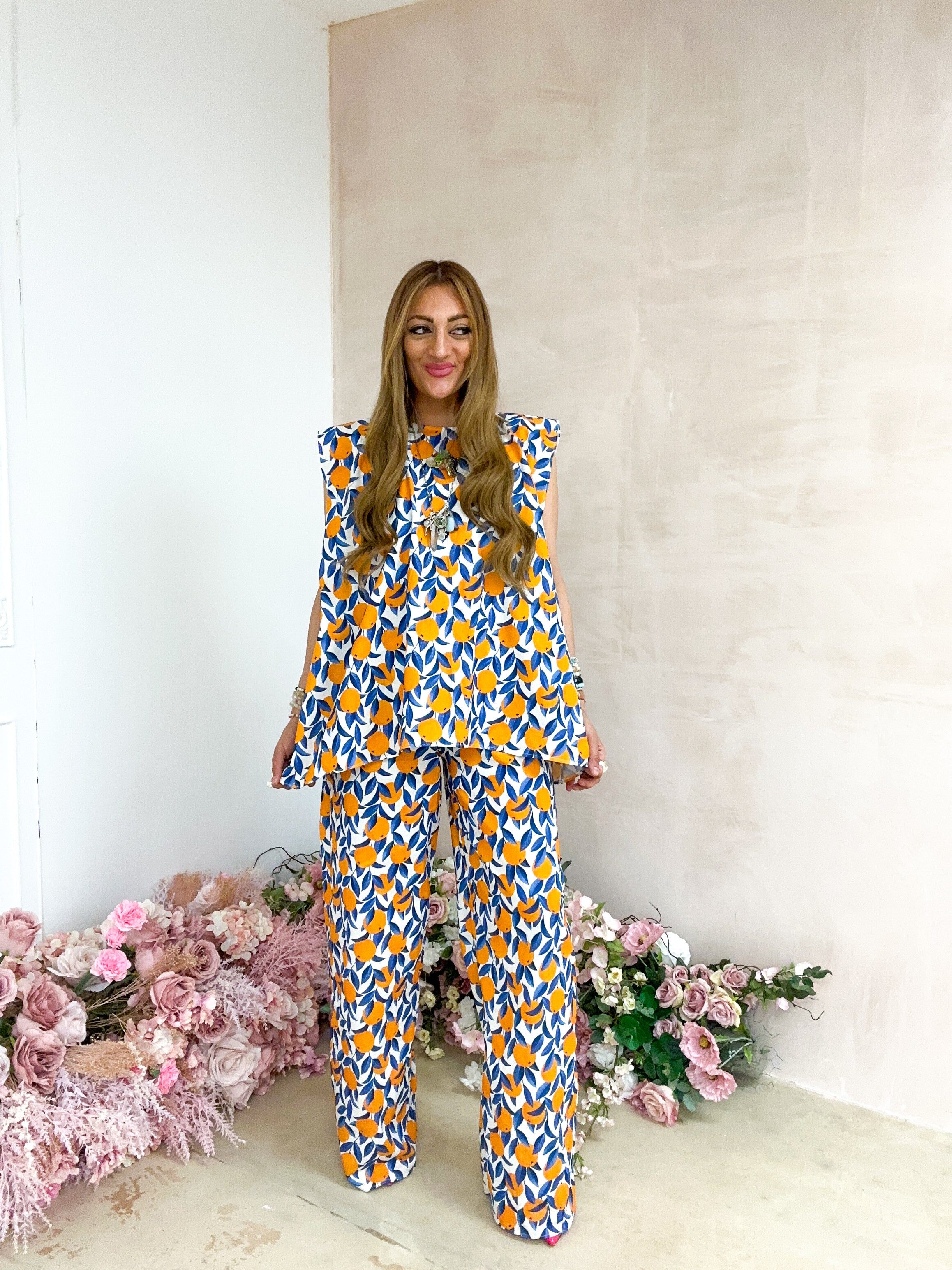 The Sicilia Belted Top In Scattered Orange Print