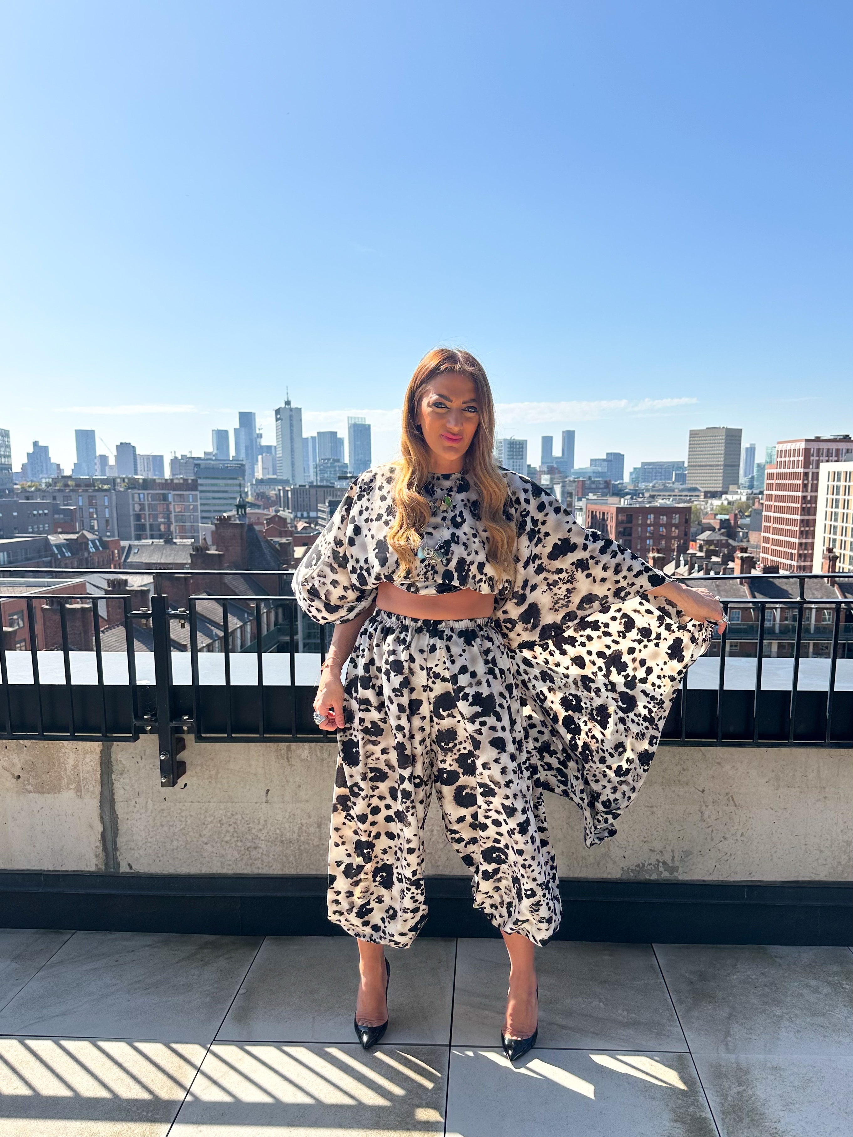 The Jasmine Chiffon Cape Top In Abstract Leopard Print