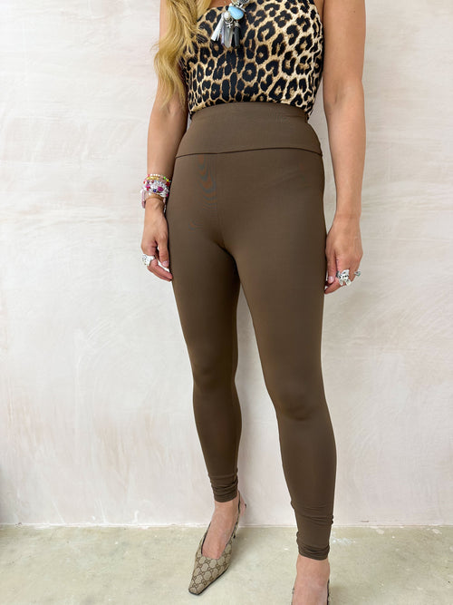 model wears brown lycra leather legging 