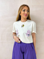 model wearing graphic style Fatima’s Hand print T-shirt In Cream