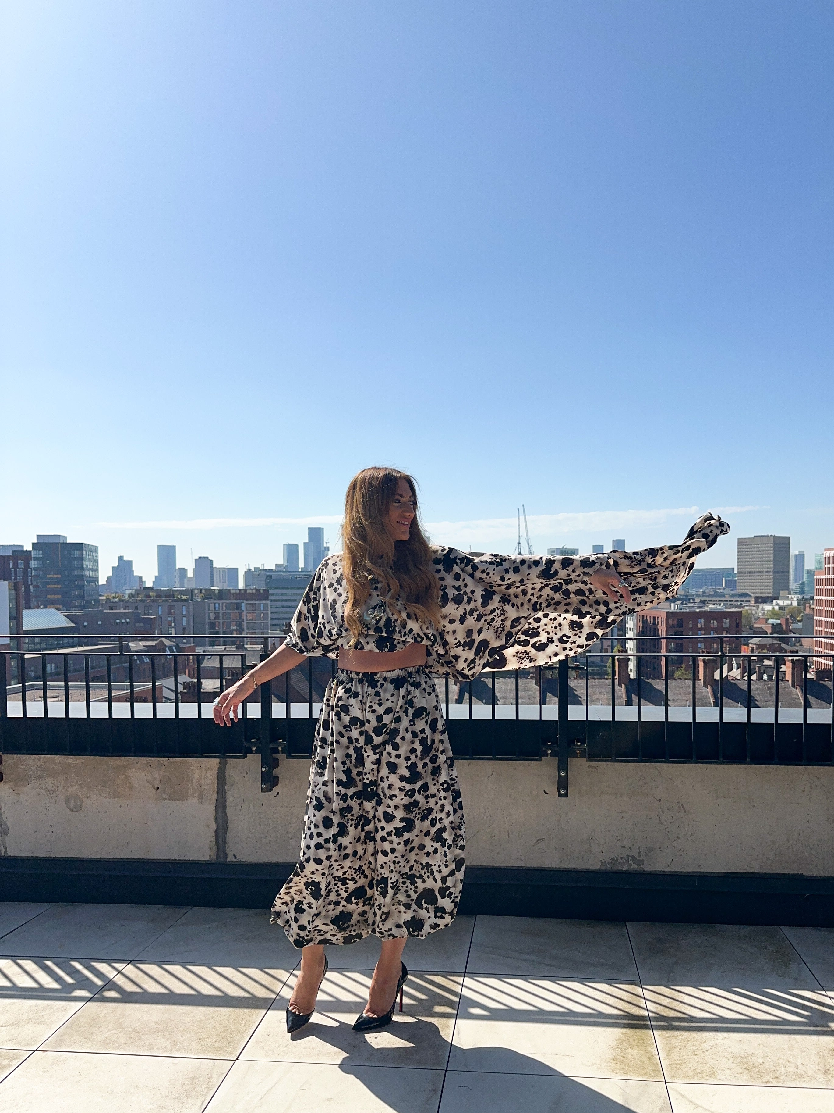 The Jasmine Chiffon Cape Top In Abstract Leopard Print