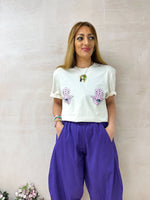 model wearing graphic style Fatima’s Hand print T-shirt In Cream