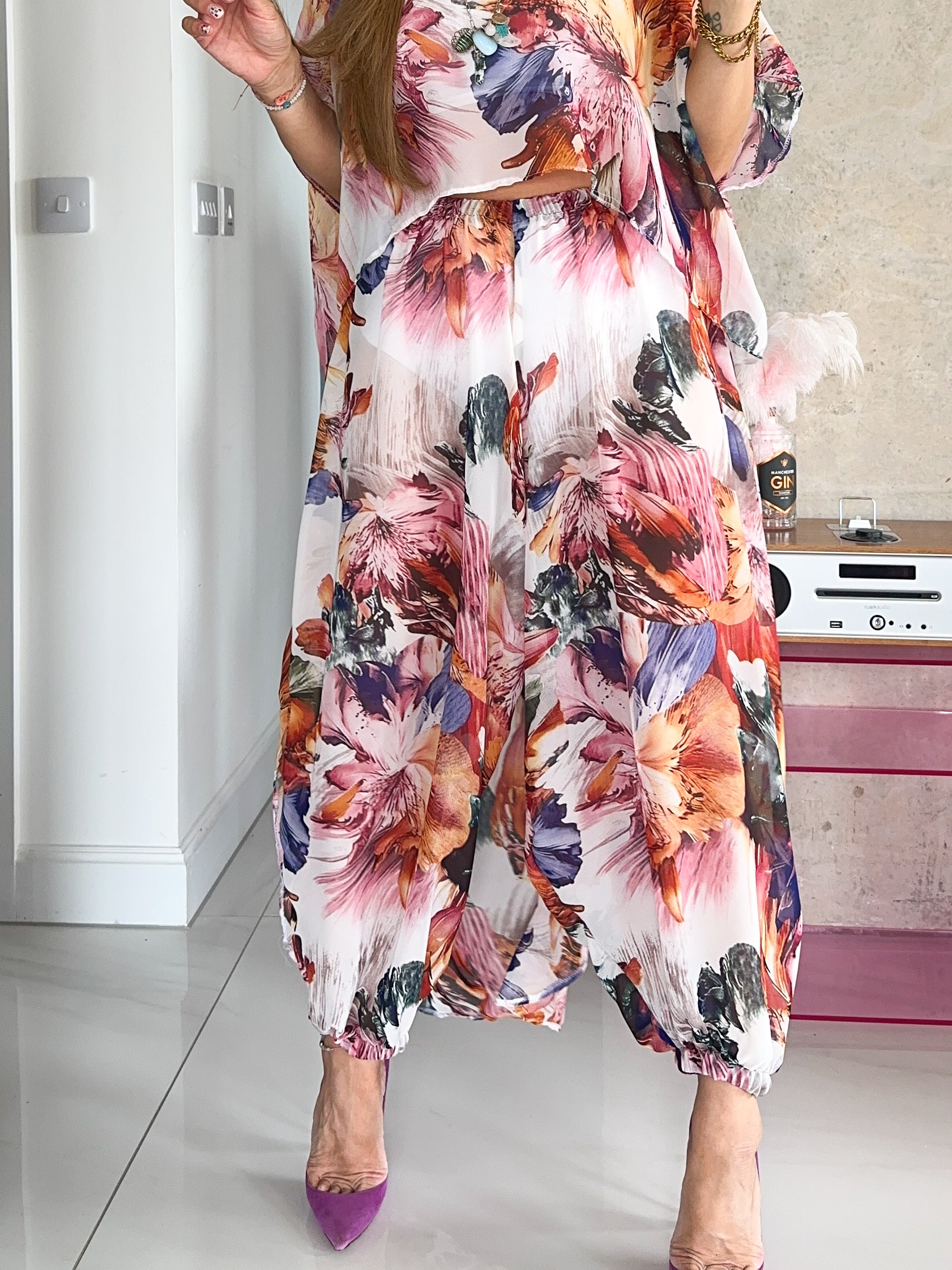 The Flora Aladdin Trousers In Floral Print