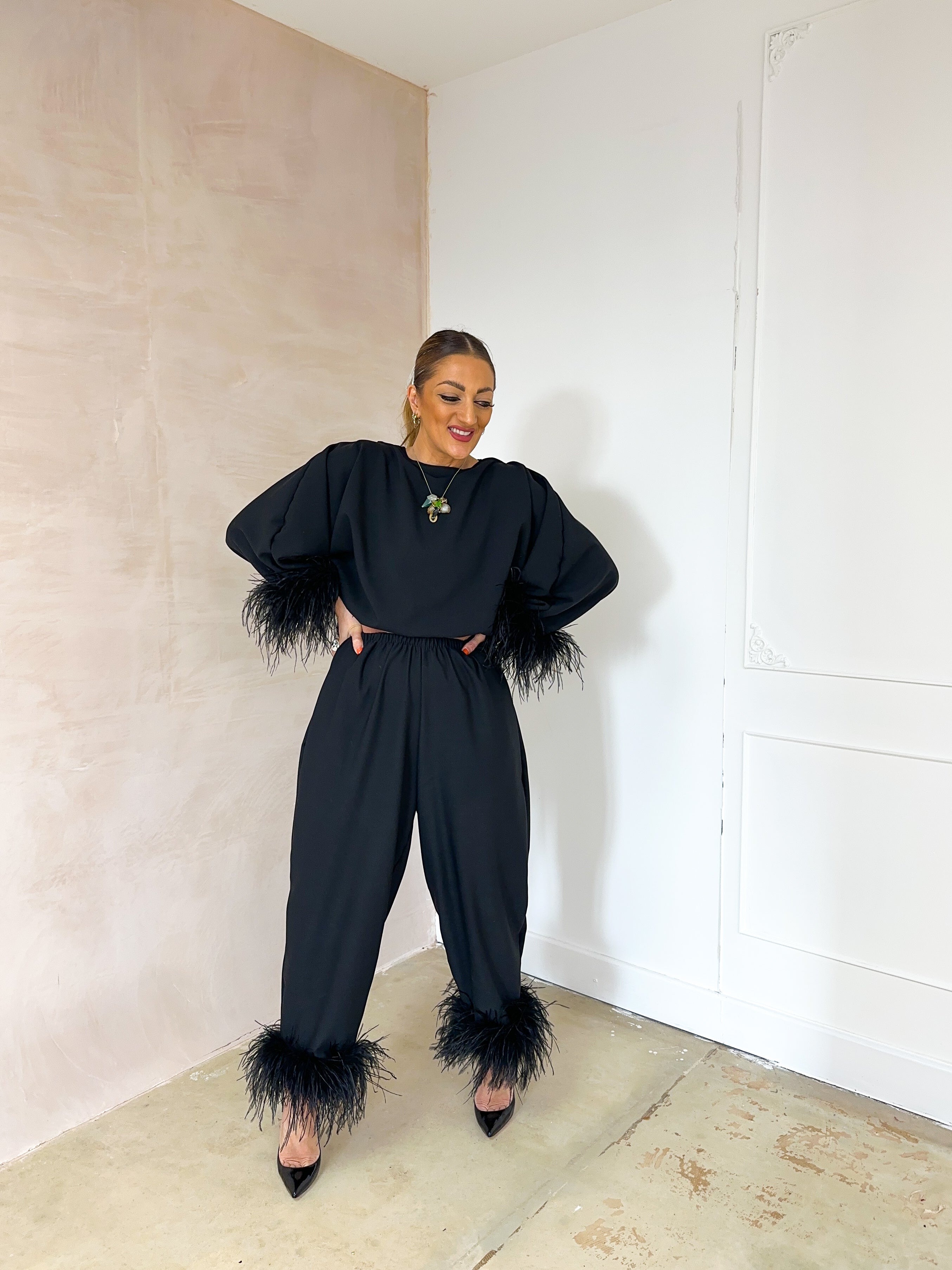 Feather Cuff Puff Sleeve Top In Black
