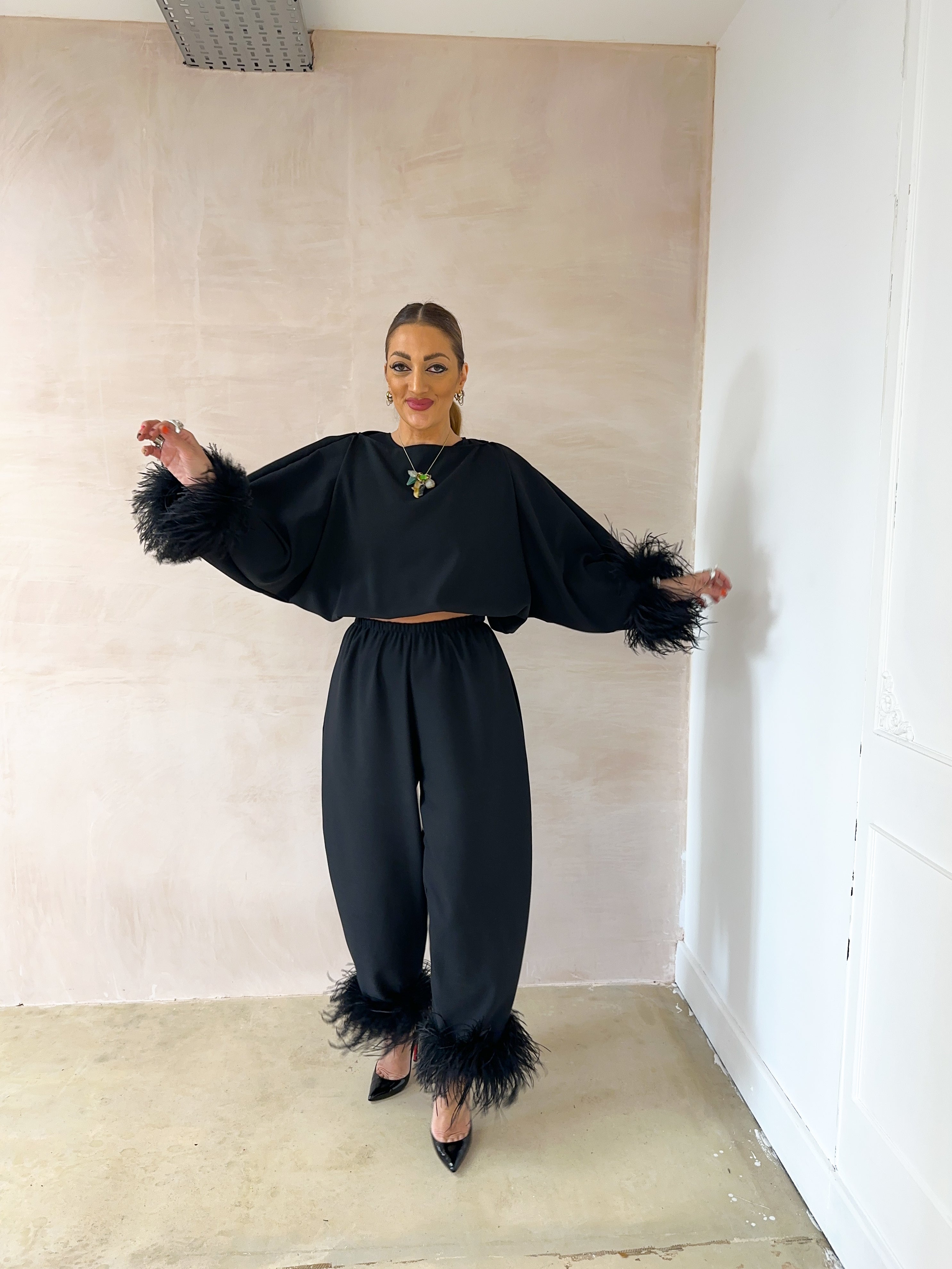 Feather Cuff Puff Sleeve Top In Black