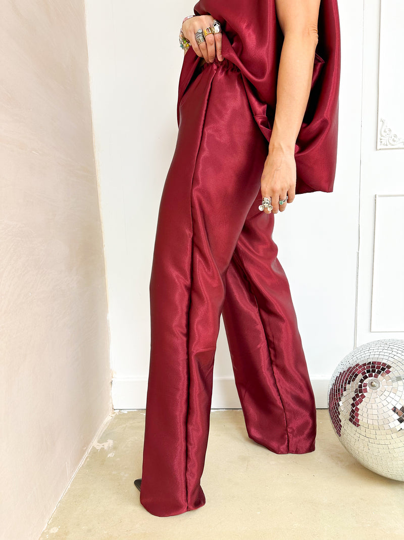 The Midnight Satin Wide Leg Trousers In Burgundy