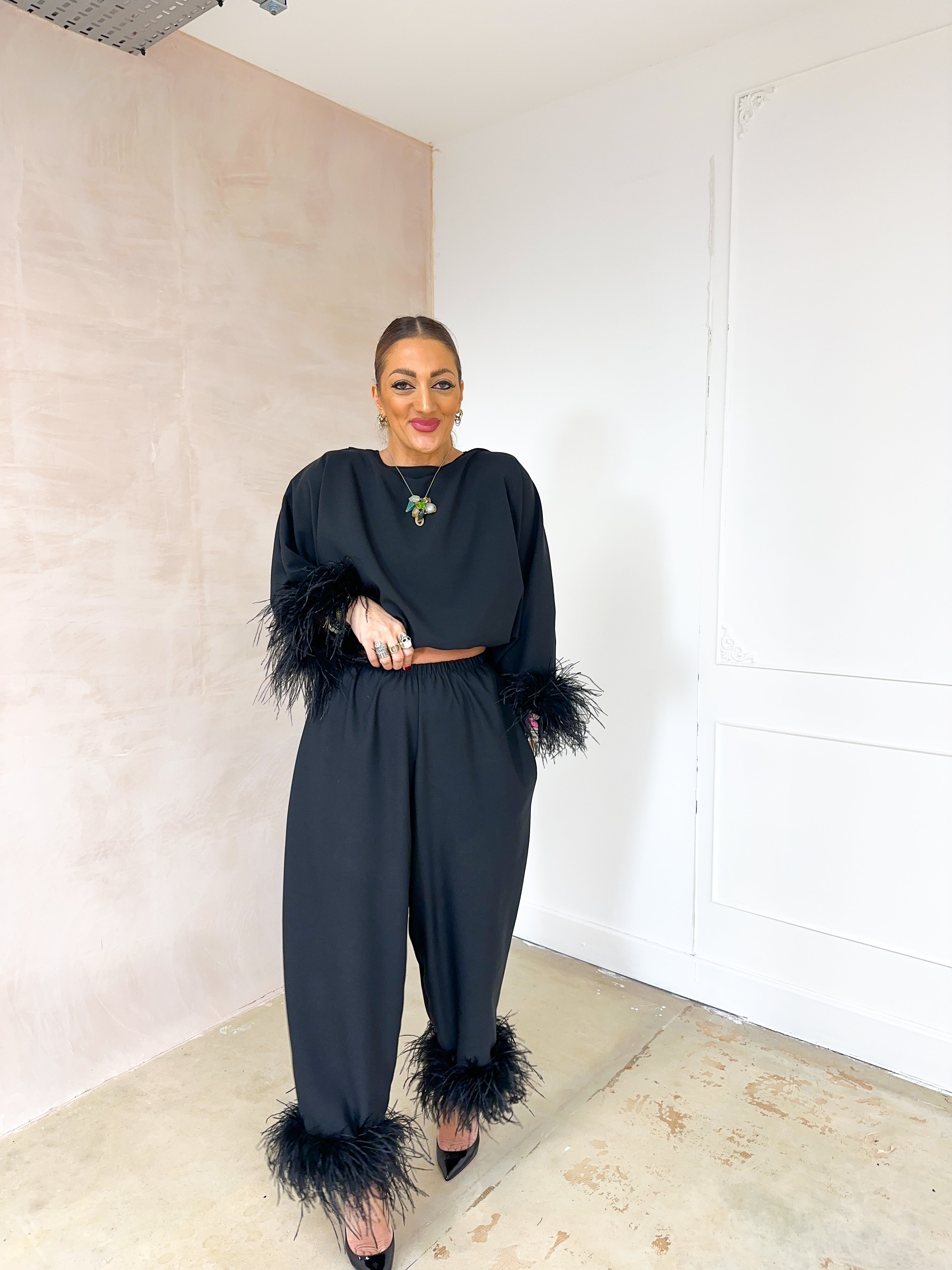 Feather Cuff Puff Sleeve Top In Black